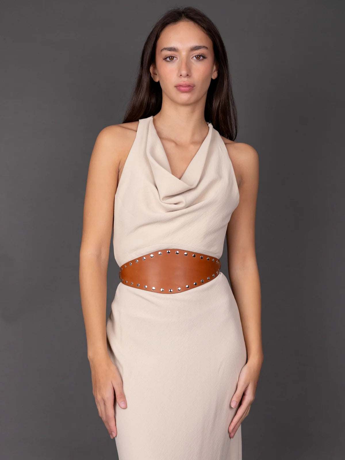 model wears a leather harness for women