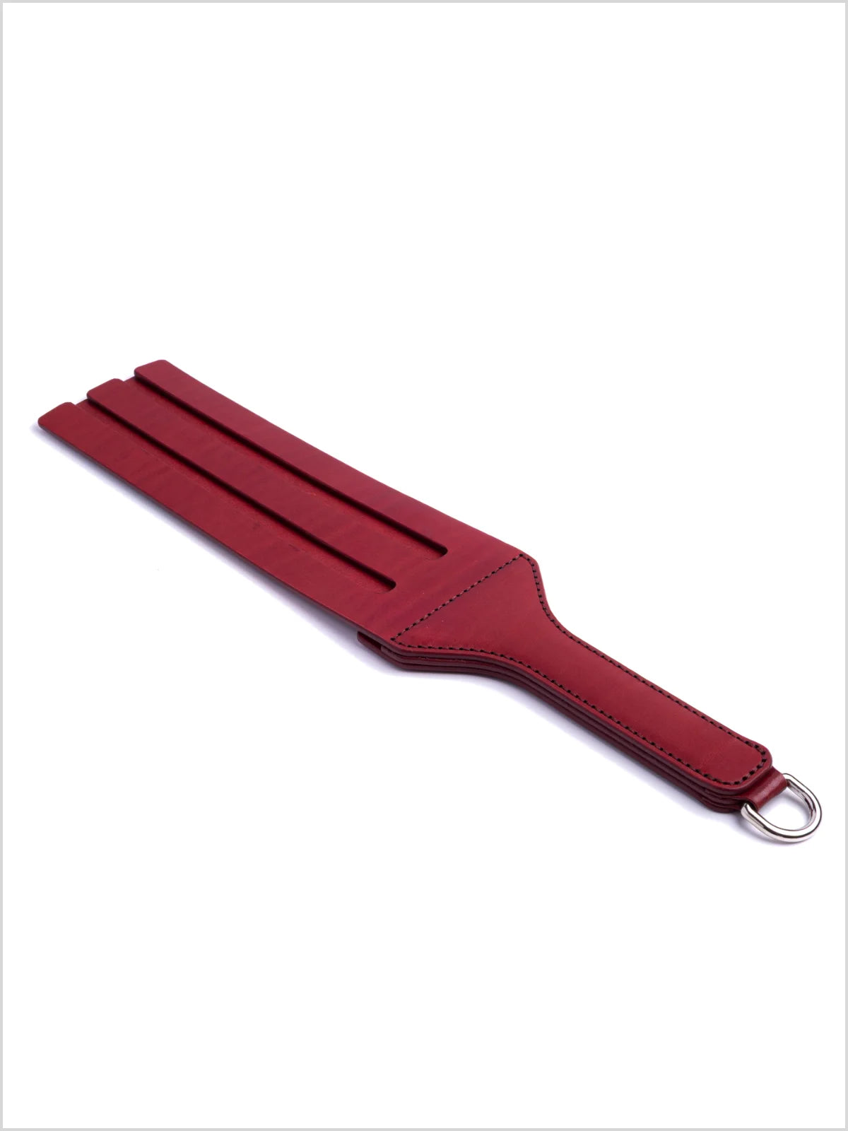 Photo produit d’un paddle bdsm rouge sur fond blanc